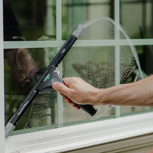 Squeegee used for interior window cleaning by hand